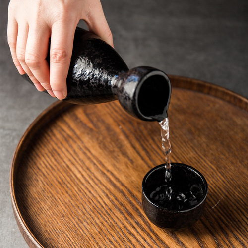 Japanese snowflake glaze black ceramic dining set including sushi plate, sake jug, cup, rice bowl, and meal plate set