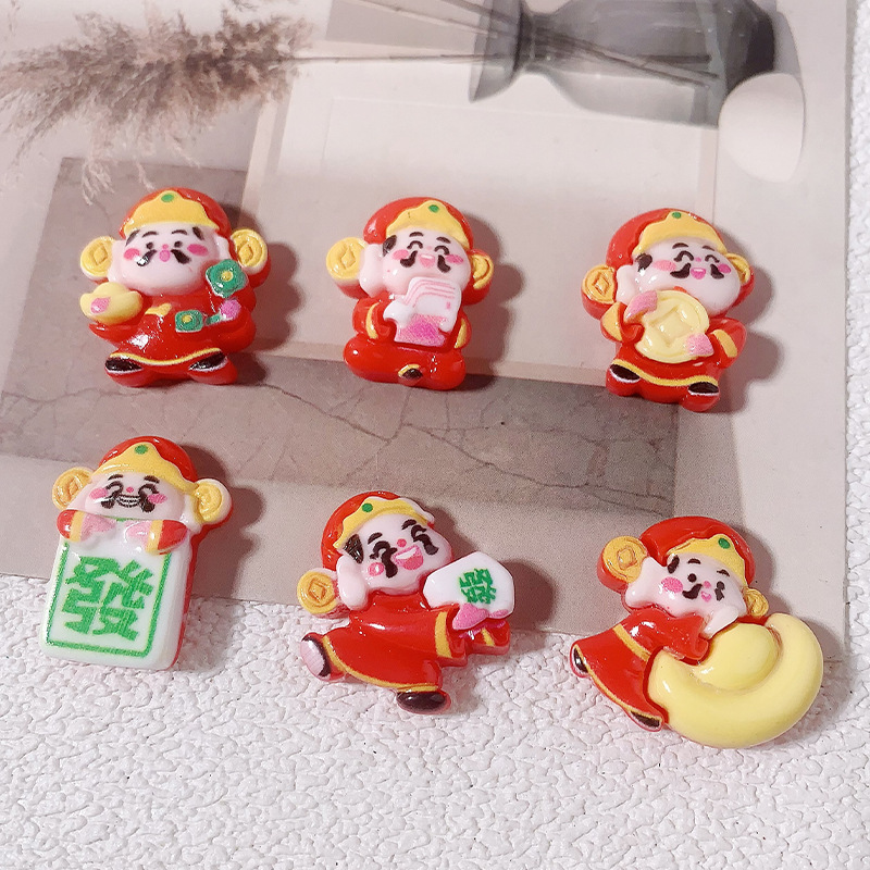 Año Nuevo dibujos animados dios de la fortuna Yuanbao accesorios de resina agujero zapatos caja de teléfono celular crema pegamento DIY automóvil control central dios de la fortuna