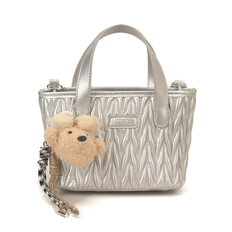 Coreano simple bolso de mano plegable de color sólido bordado de estilo extranjero bolso de hombro para hombres y mujeres nuevos accesorios para niños transfronterizos
