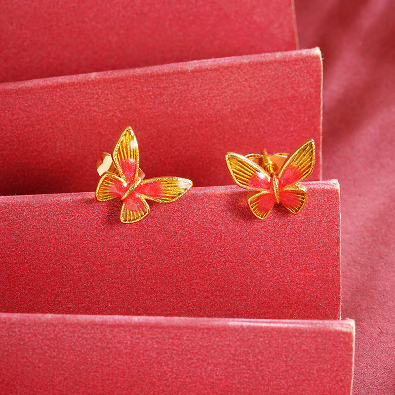 Nuevos productos vietnamitas arena lujosa ligera estilo de moda gradiente mariposa pernos de orejas nicho no se desvanecerá el diseño de joyas al por mayor