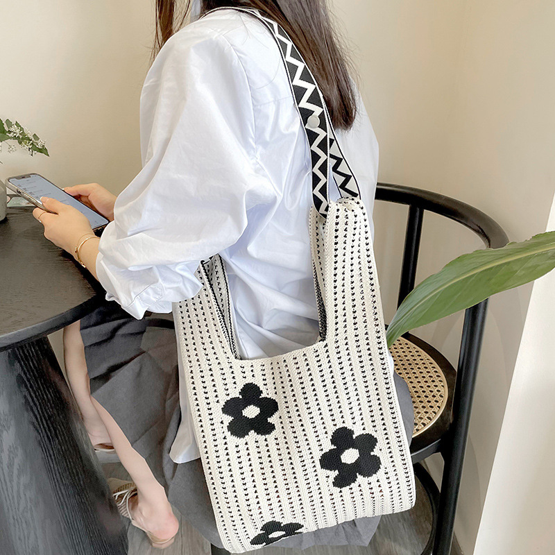 Estilo coreano nicho diseño moda hueco pequeña flor de punto bolso de mano estudiante de gran capacidad bolso de las axilas bolso de las mujeres