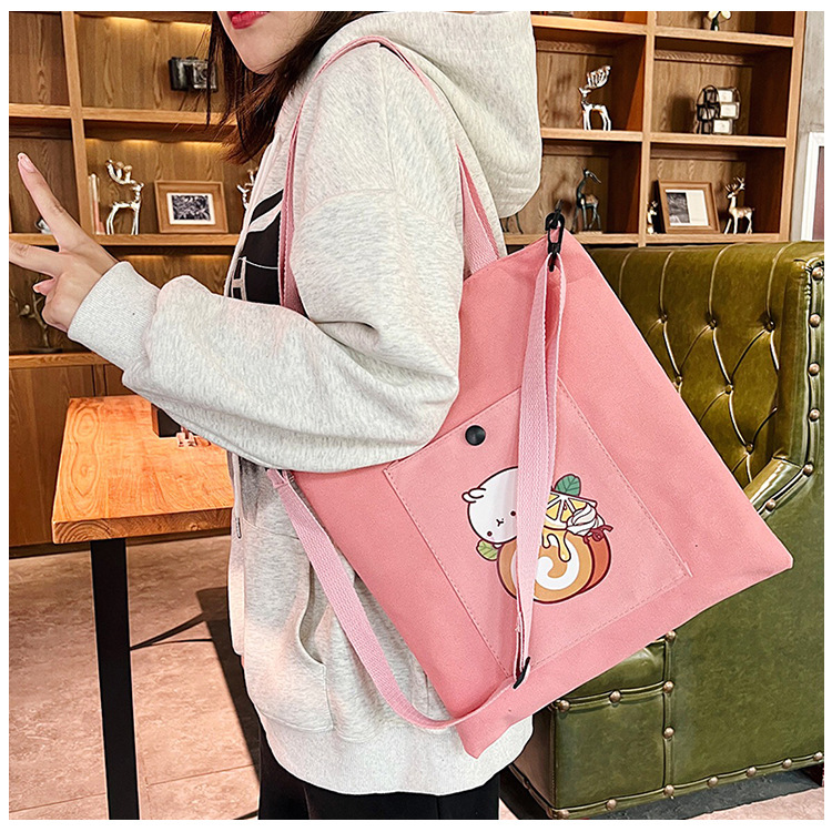 The new Korean-style cute Japanese-style single-shoulder bag is selling well. It's a simple and versatile canvas bag for college students' crossbody tutoring Application Scenario