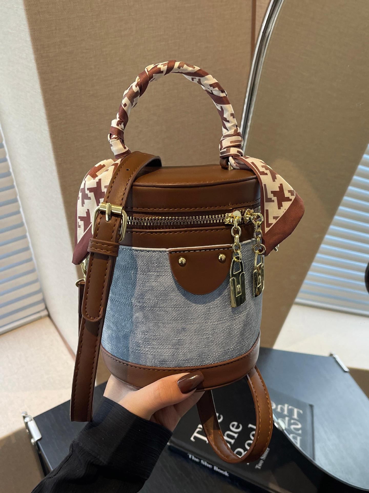 Nuevo bolso de cubo portátil de color súper fuego transfronterizo 2025 para mujer Nuevo bolso de hombro de mensajero de moda occidental para mujer