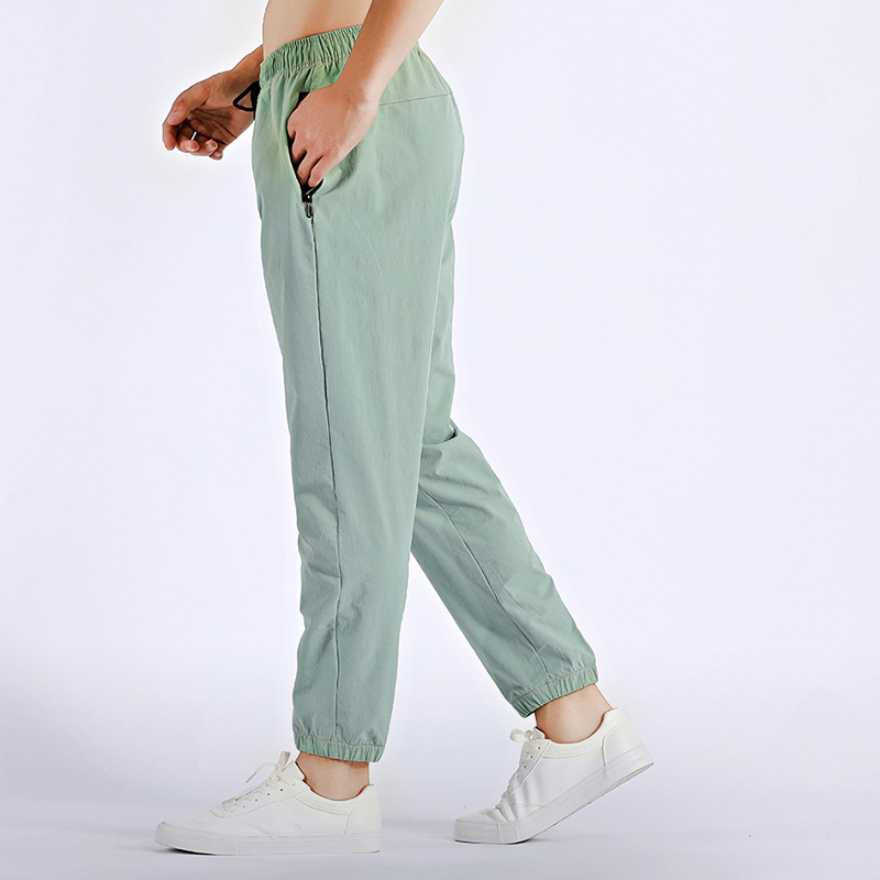 Otoño e invierno Pantalones deportivos al aire libre deportes correr pantalones de hombre ropa casual pantalones de fitness de secado rápido pantalones de chándal de baloncesto pantalones atados al tobillo