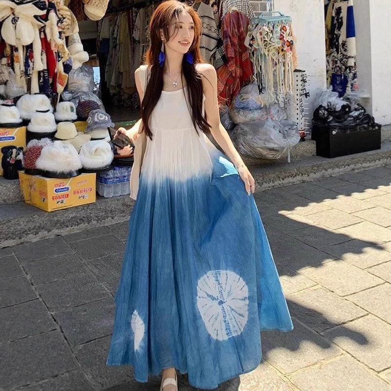 民族风海边度假蓝色扎染吊带连衣裙女夏季收腰大摆裙A字中长裙子