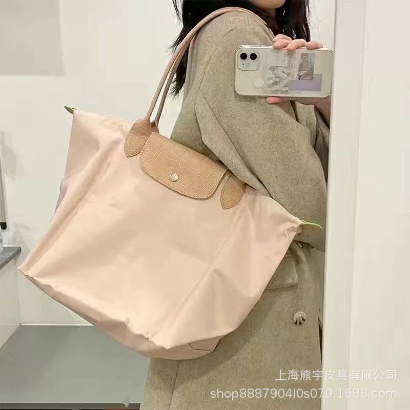 Foldable capacious purse for mother and baby, one-shoulder bag