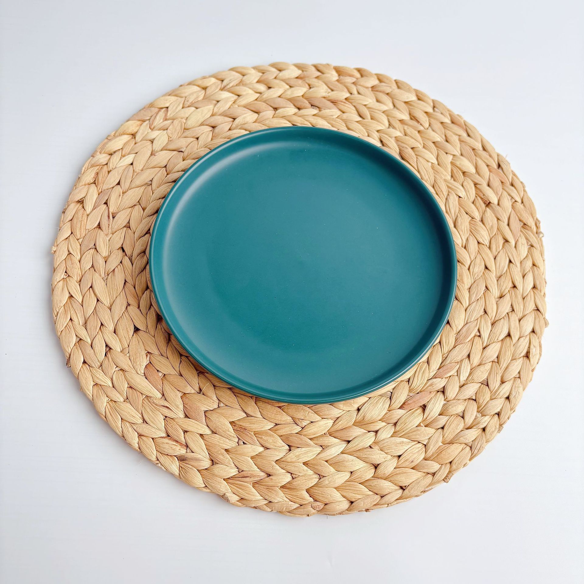 Fabricante Almohadilla de paja Almohadilla Tejida a mano de estilo japonés Almohadilla de decoración de mesa de comedor de aislamiento térmico antiescaldado de Vietnam