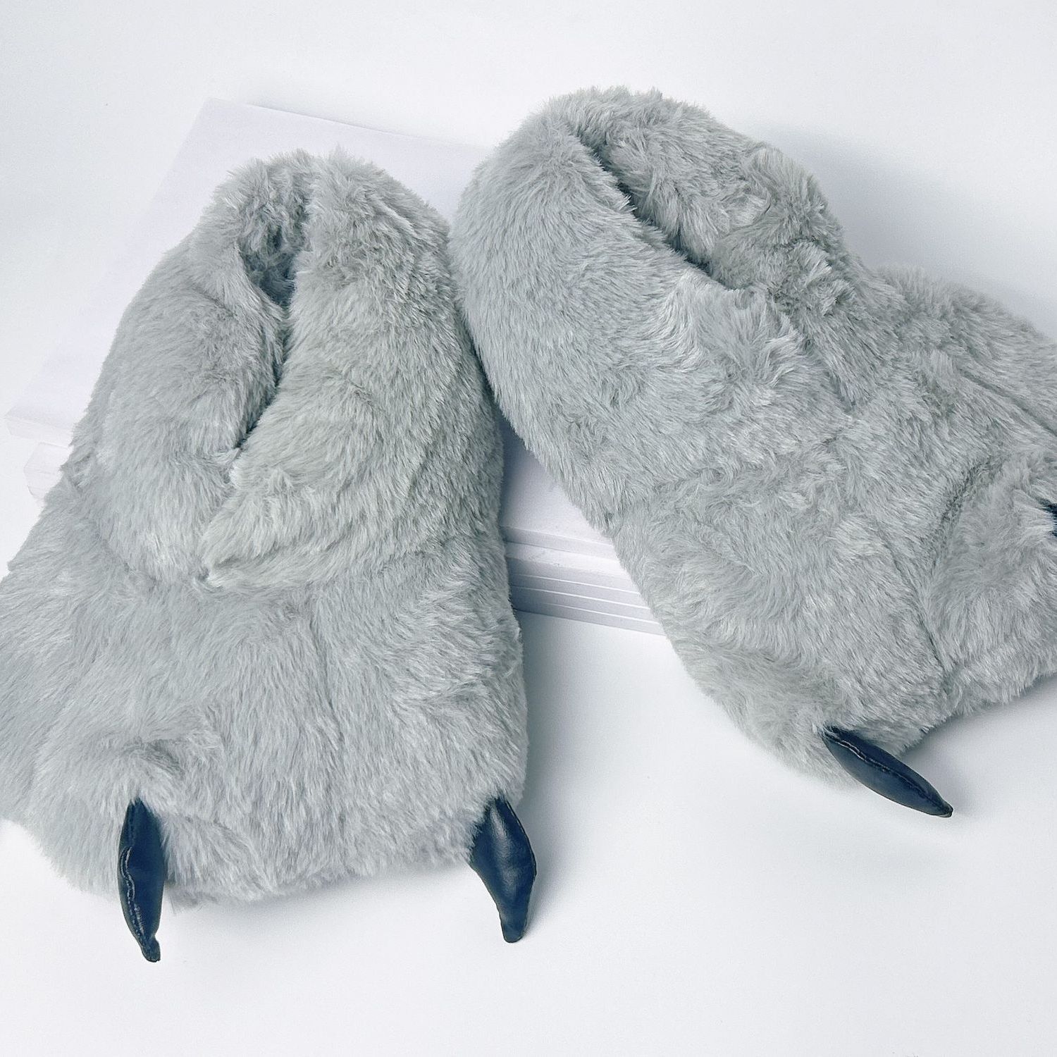 Los fabricantes suministran zapatos de garra de piel de conejo de imitación de color naranja Otoño e Invierno zapatos de garra de animales de dibujos animados zapatos calientes zapatos de algodón mudo zapatos caseros