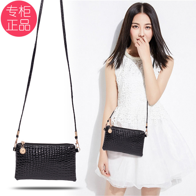 Una bolsa de mujer, bolso de moda 2024 bolso de hombro de mujer, bolso de tela de cocodrilo, bolso de cambio de teléfono móvil