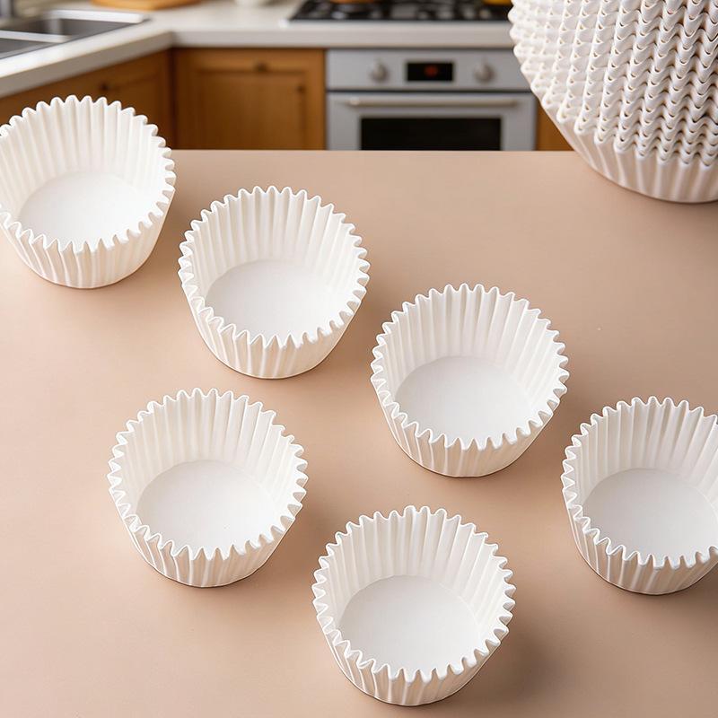 Disposable paper cupcake liners for home use, round, oil-resistant, heat-resistant, oven-safe, and adhesive