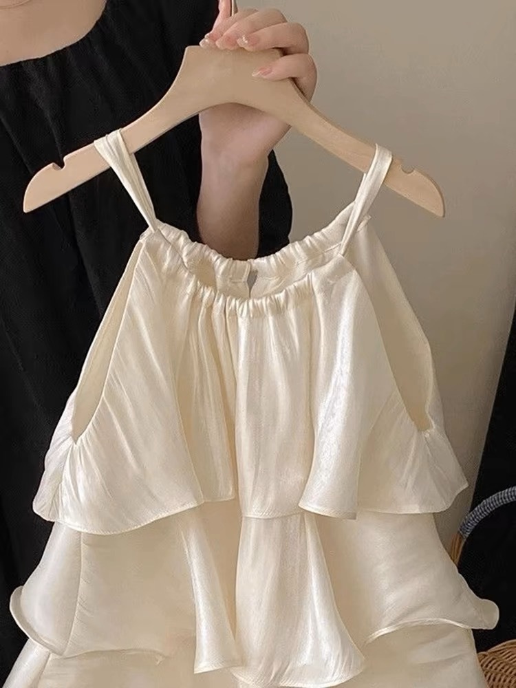 Xianning siete ropa para niños 25 verano nuevo vestido de temperamento dulce para niñas falda de tirantes de pastel con volantes de alta gama