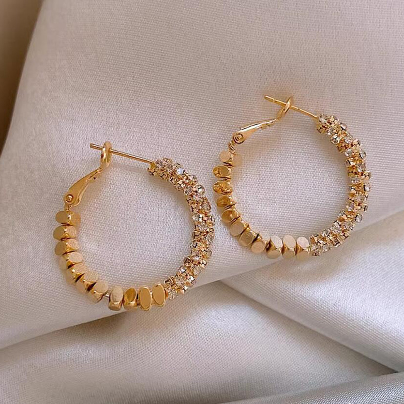 2025 nuevo estilo círculo de moda hebilla de oreja de plata rota cobre chapado en oro real pendientes elegantes de moda pendientes de lujo ligero de alta gama