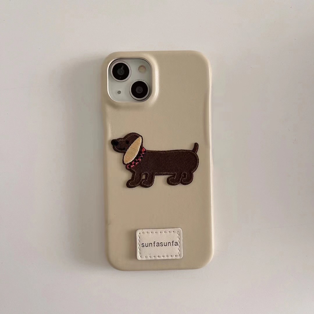 Perro sf4 de dibujos animados bordado de cuero beige