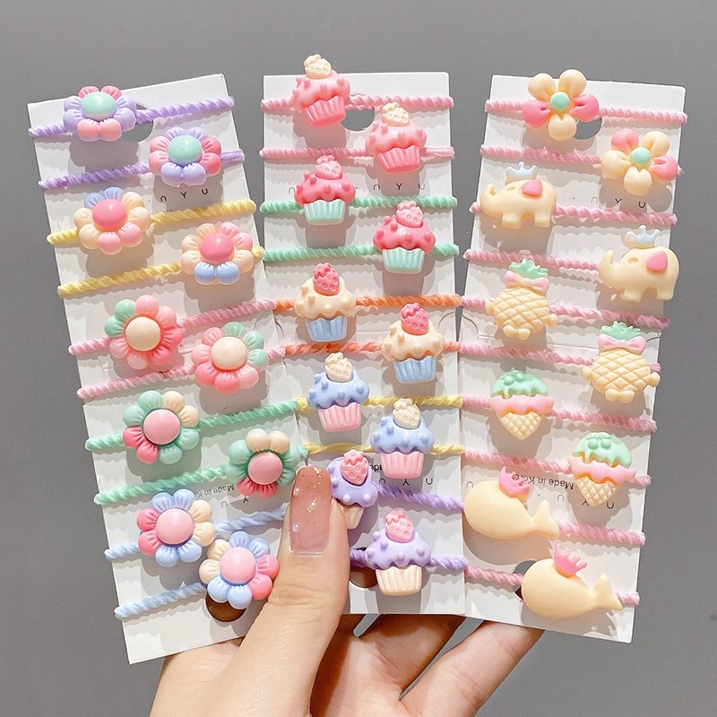 La cuerda del pelo del bebé de las muchachas de la banda de goma de los niños no lastima el pelo Los accesorios del pelo del pulgar del tamaño pequeño atan la banda de goma del pelo