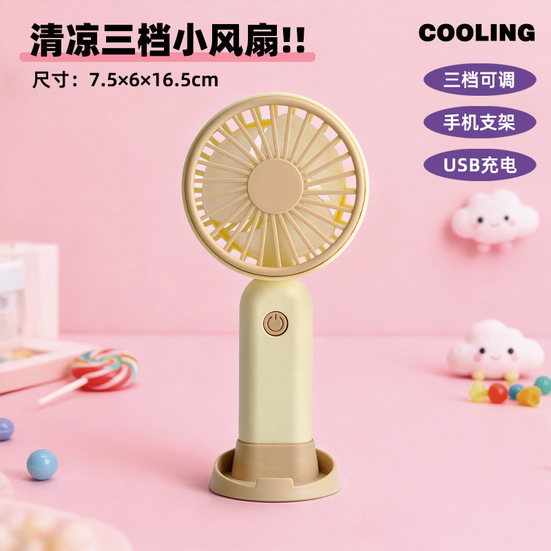 2025 nuevo ventilador de mano pequeño regalo de estudiante de dibujos animados lindo escritorio portátil mini ventilador de carga USB