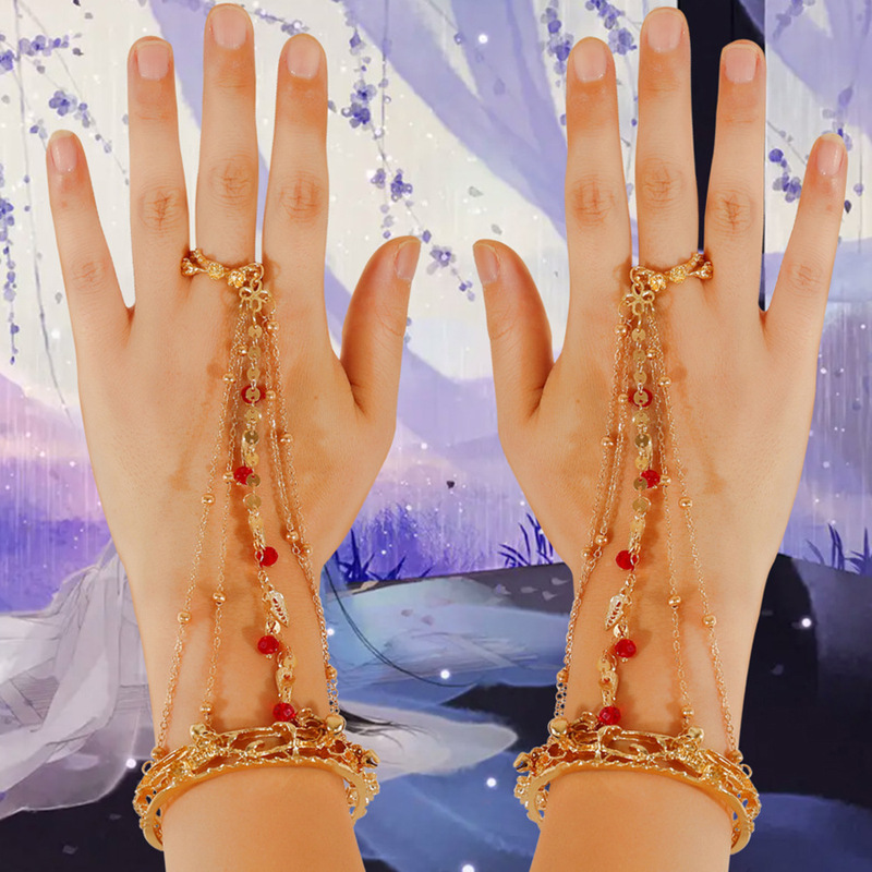 Ancient style hanfu travel photography Dunhuang dance accessories hollow plum blossom red beads leaf pendant single ring bracelet bracelet