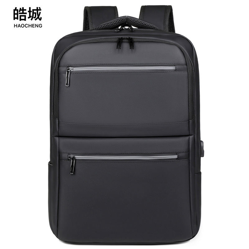 Comercio exterior al por mayor 2024 nueva mochila USB para hombres de negocios de película de cuero simple y versátil mochila para computadora de gran capacidad