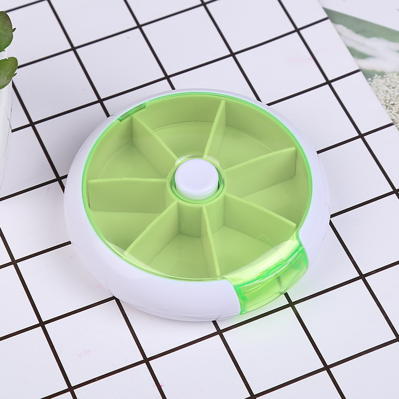 Caja redonda de la píldora de una semana siete-rejilla que gira la Mini caja plástica portátil de siete días de la píldora