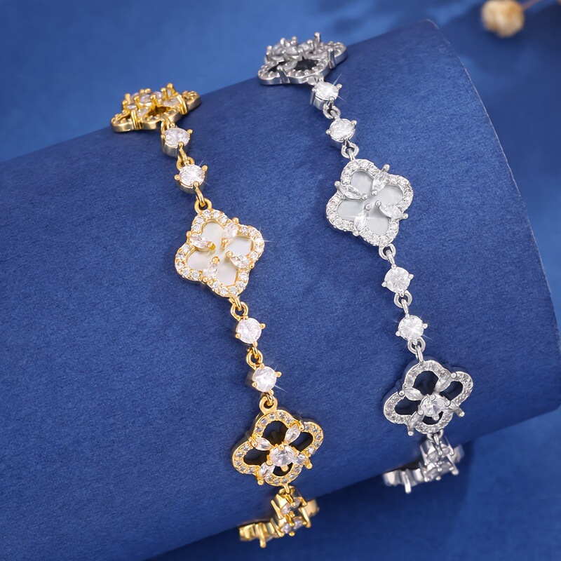 Cross-border new simple lucky four-leaf clover pull bracelet adjustable size jewelry gold and silver two-color optional wholesale Cross-border new simple lucky four-leaf clover pull bracelet adjustable size jewelry gold and silver two-color optional wholesale