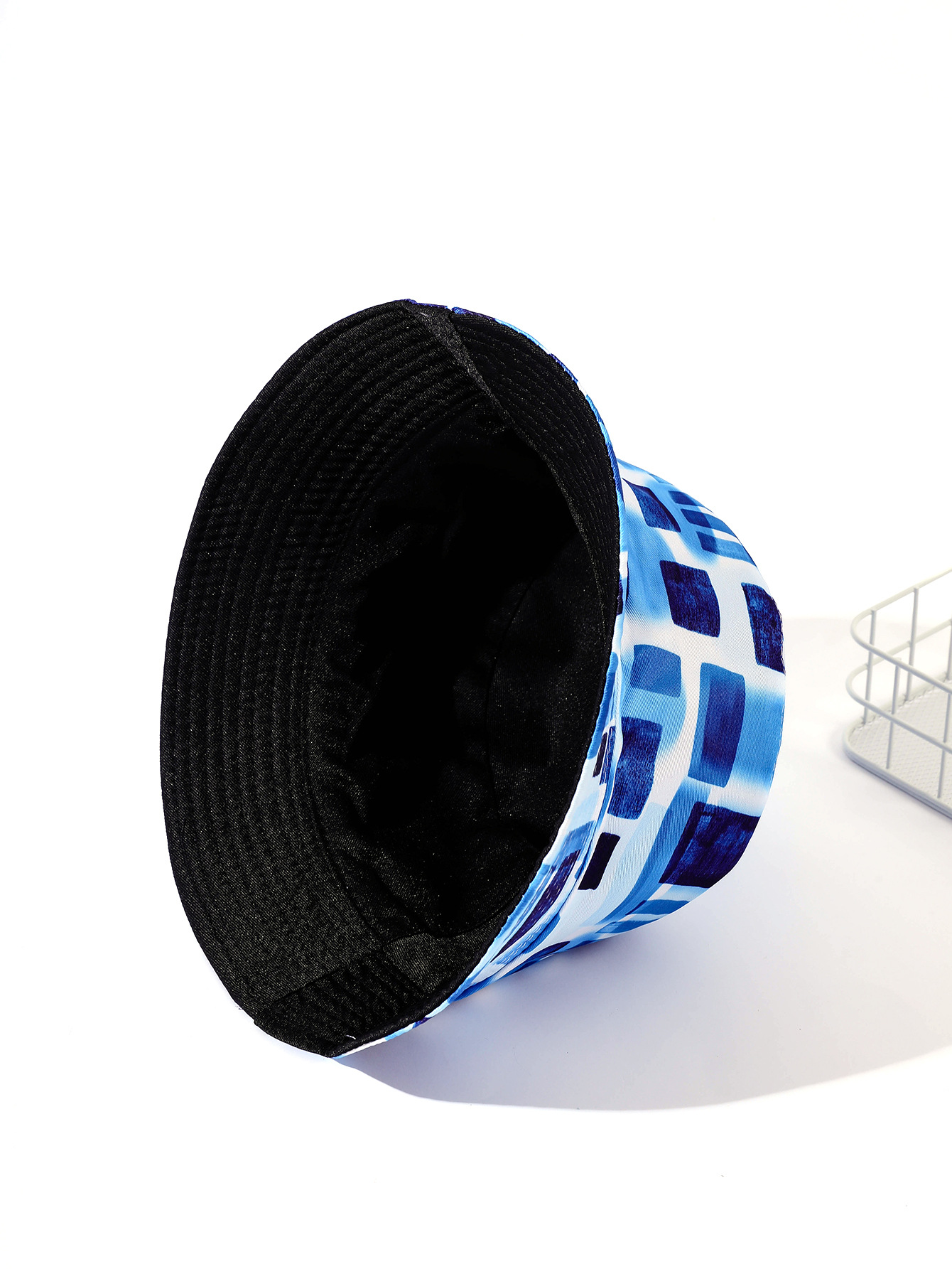 Verano nuevo doble cara de maraña teñida geométrica pescador sombrero de pasarela personalidad abstracta cuenca sombrero moda sombrero hombres y mujeres