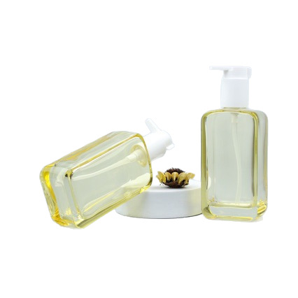 AM Fuyu Manpu mismo estilo 150g botella de limpiador facial presionando esencia loción botella de vidrio cosméticos sub-embotellado en stock