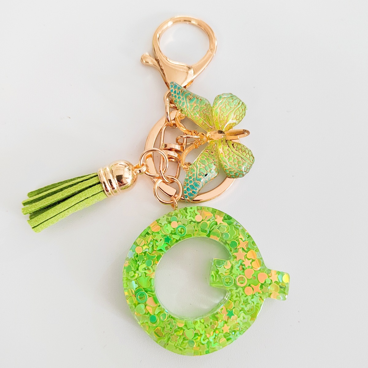 26 letras inglesas llavero colgante estrella verde brillo gota resina colgante llavero de personalidad europea y americana