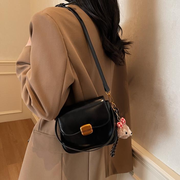 Bolso de tendencia popular de comercio exterior para mujeres 2025, nueva moda extranjera simple bolso de hombro de alta sensación bolso pequeño