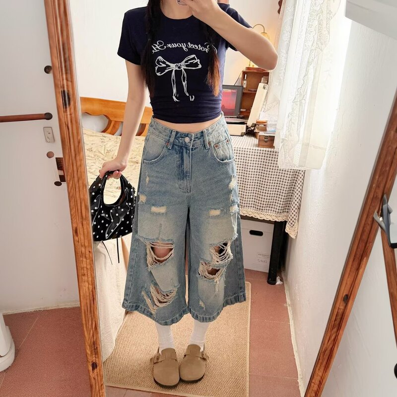 Wholesale in-stock ripped straight-leg denim cropped pants for women, summer loose plus-size everyday slimming wide-leg jeans Wholesale in-stock ripped straight-leg denim cropped pants for women, summer loose plus-size everyday slimming wide-leg jeans