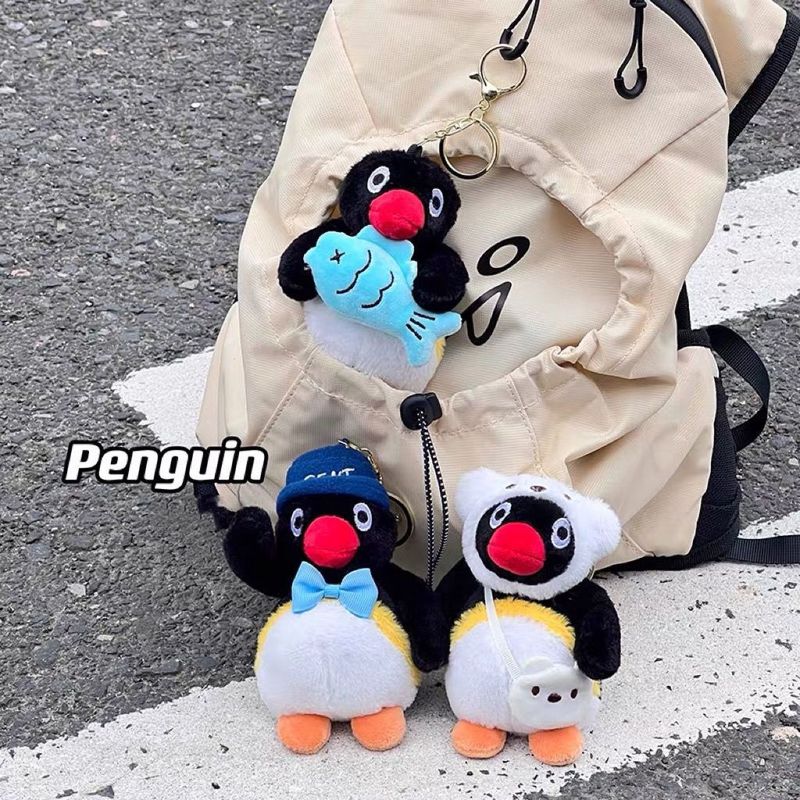 漫画のピンク色のペンギンバッグキーホルダー、ミニおもちゃ、クリエイティブなギフト、リボン付き|undefined