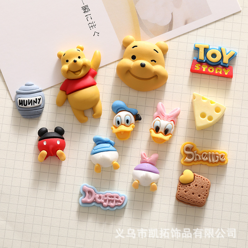 Hot cartoon Pooh bear Donald Duck series diy resin accessories mobile phone shell hairpin hole shoes pendant material Hot cartoon Pooh bear Donald Duck series diy resin accessories mobile phone shell hairpin hole shoes pendant material