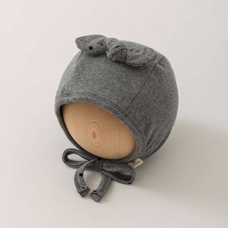 Sombrero para bebés primavera y otoño adorable gorra de lazo para recién nacidos protector de oídos puerta de invierno gorra de cabeza