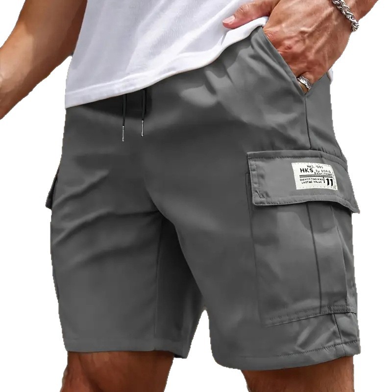 Pantalones cortos de trabajo de verano transfronterizos para hombres sueltos, secado rápido, pantalones casuales de cinco centavos de tamaño europeo, pantalones de bolsillo recto resistentes al desgaste
