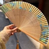 Women's fan from thousands of miles away