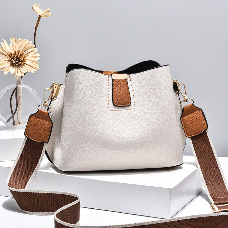 Bolsos de balde de textura mini bolsos de mujer litchi 2025 nuevo estilo de moda bolsos de hombro de color contraste bolsas de moda