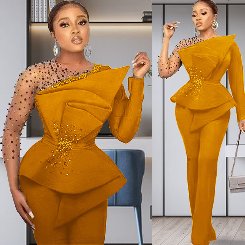 Completo pantalone donna taglie forti con dettagli in mesh e perle_voghion.com