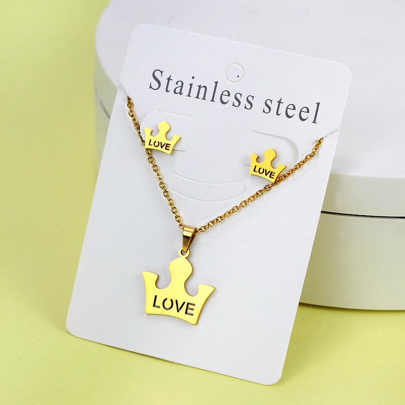 Conjunto de collar de pendientes de oro de acero inoxidable europeo y americano, collar de mariposa de amor de diamante, colgante, cadena de clavícula, fábrica al por mayor