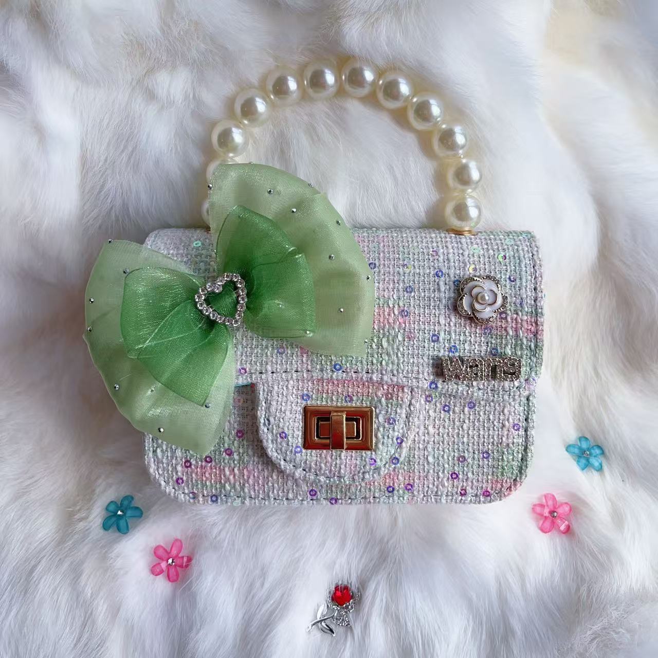 Nuevo tipo de bolsos para niños, bolsos de moda, bolsos de princesa de viento, bolsos portátiles lindos para chicas, bolsos de red para bebés.