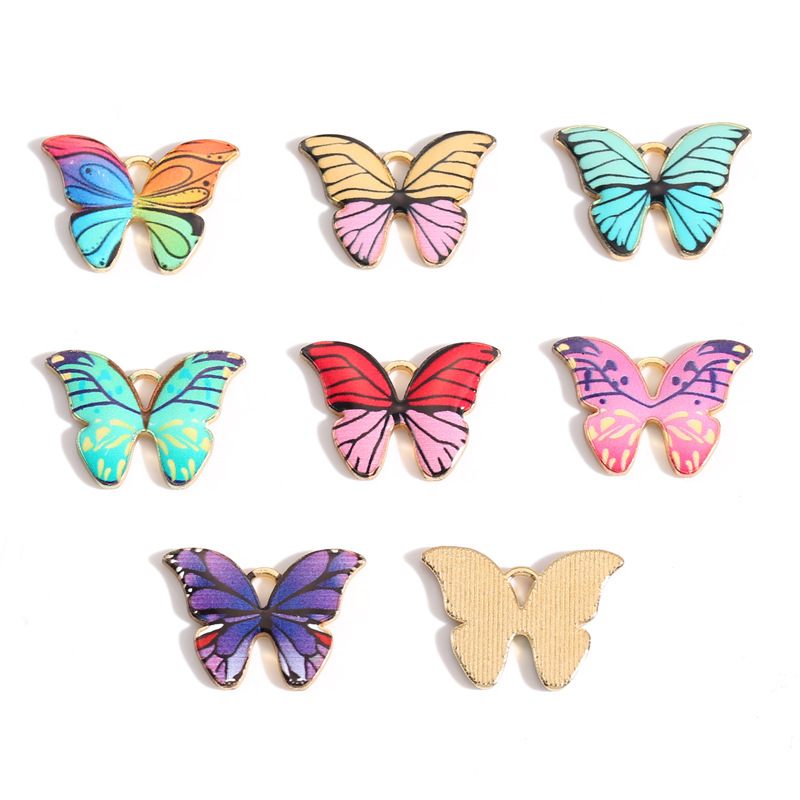 Venta caliente transfronteriza accesorios de joyería de moda europea y americana accesorios de mariposa de color accesorios de joyería de aceite de goteo de aleación 21*15mm