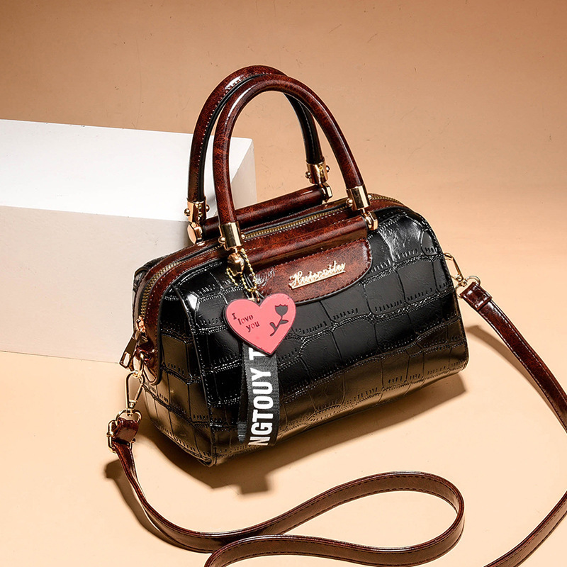 Bolso de textura 2025 nuevo bolso de hombro con diseño de patrón de piedra, bolso de mensajero universal de asistencia informal, bags transfronterizos