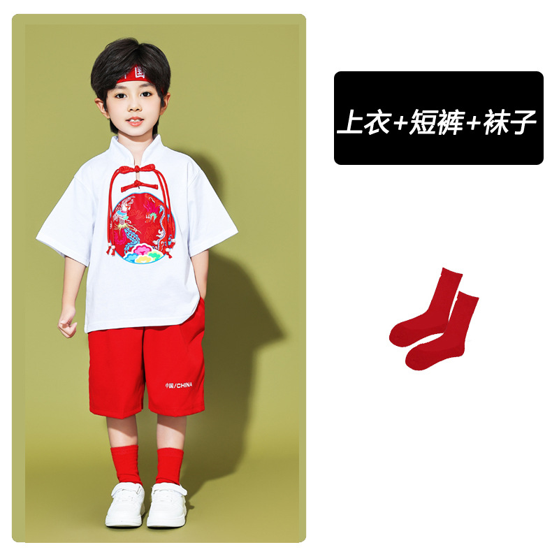 White colour circle, T-shirt, red shorts, socks