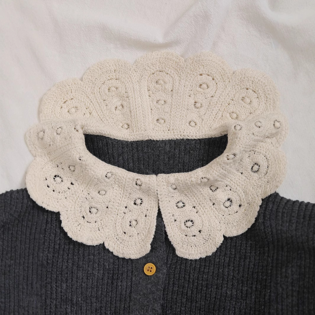 Knitted cardigan, with embroidery