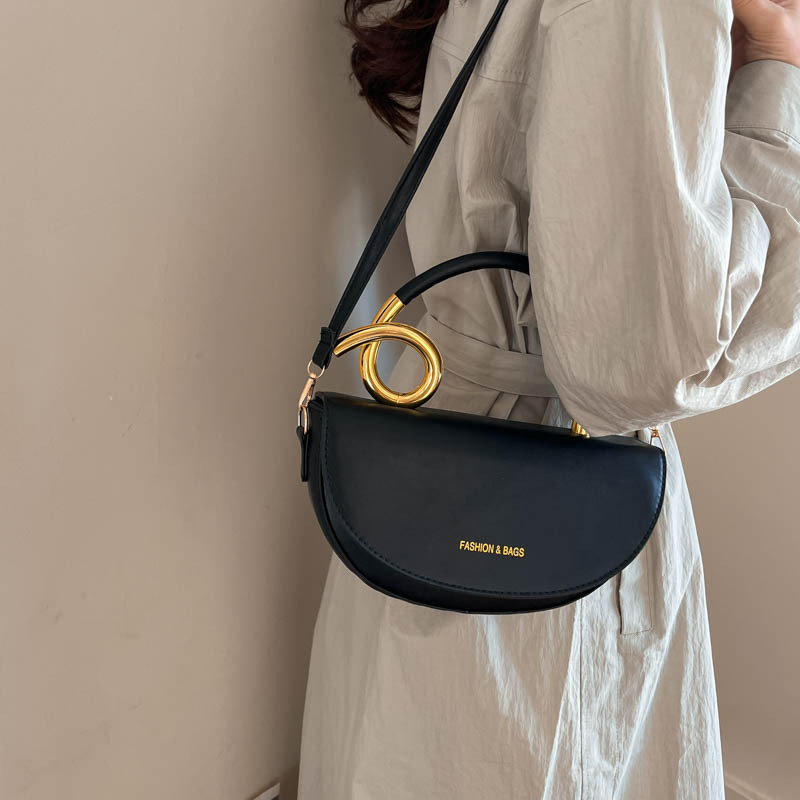 Diseño de alta calidad bolsos de mano bolsos de mujer sensación retro nicho silla transfronteriza estilo simple nueva bolsa universal
