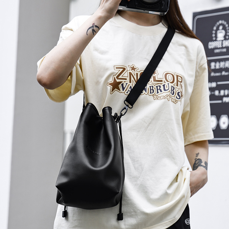 キヤノンニコンソニー富士一眼レフカメラバッグを適用して、片肩斜めに撮影した内胆バッグを収納して保護する