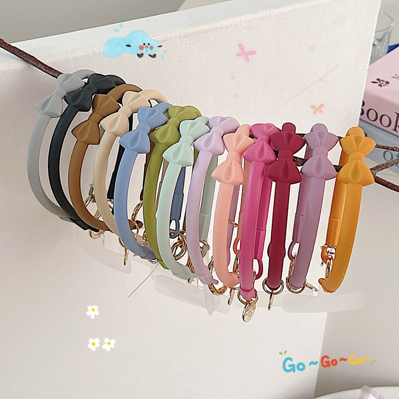 アニメの蝶結びの手紐のキーホルダーはアウトドアスポーツのブレスレットを掛けます。|undefined