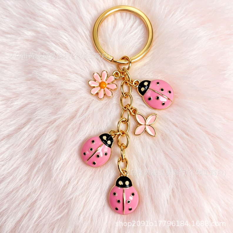 Cross-border sweet seven-spotted ladybug daisy keychain ins style girls' backpack pendant niche accessories wholesale Cross-border sweet seven-spotted ladybug daisy keychain ins style girls' backpack pendant niche accessories wholesale