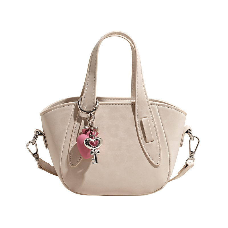 Retro nicho leopardo bolso de cubo de mujer otoño invierno 2025 nuevo tipo de bolso de cestas de verduras de mano bolsa de hombro casual mochila moda