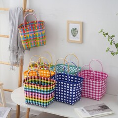 手作りの編み物のハンドバッグの女性の旅行のプラスチックバッグのお土産のプラスチックバッグの小さい方の手作りのビーチバッグ