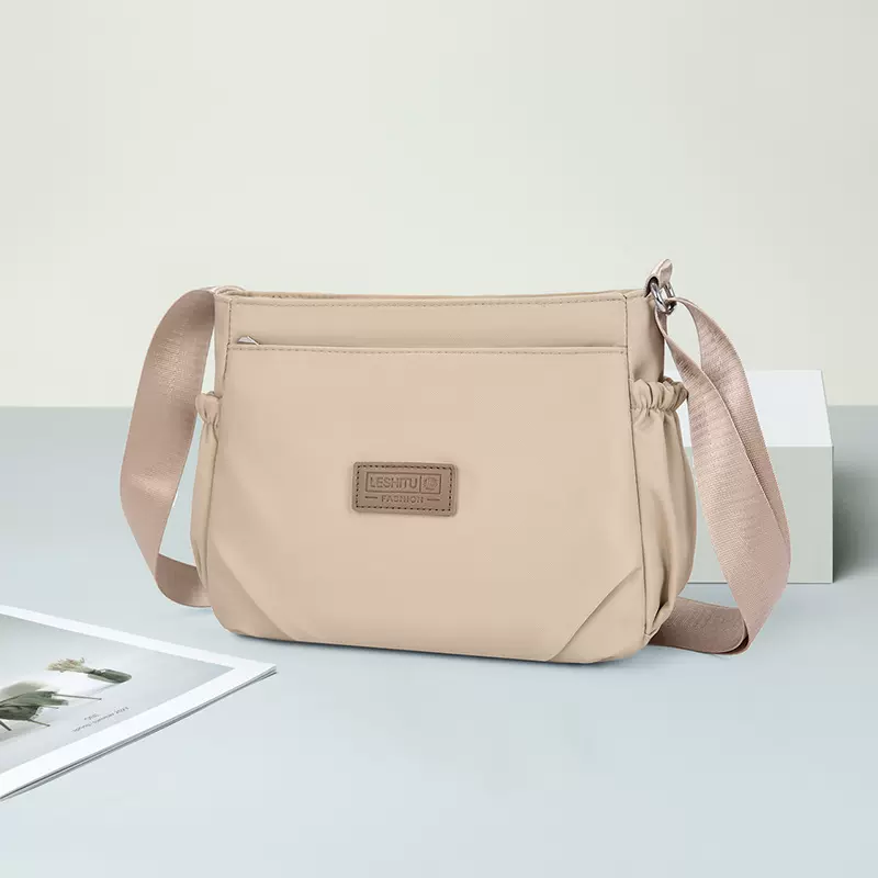 时尚多隔层单肩包包潮流逛街斜挎包大容量女士上班背包牛津布包