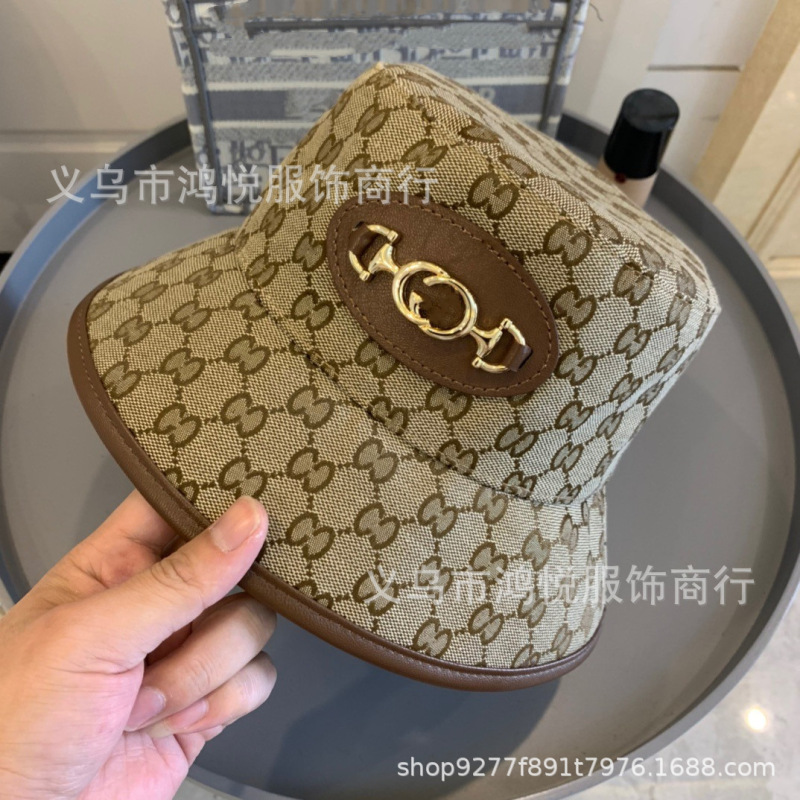 韓国スタイルの女性の漁師の帽子英国スタイルの刺繍 G 文字鉄バックル日焼け止めファッション男性の太陽の帽子卸売|undefined