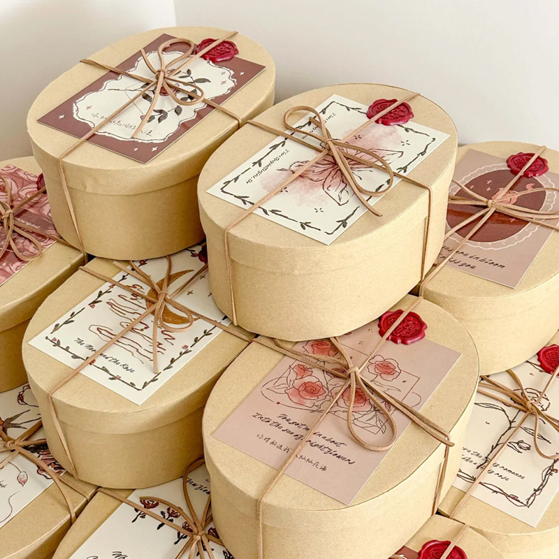 Caja de regalo de papel kraft oval, caja de flores de frutas, caja de flores de regalo de cumpleaños, caja de embalaje de flores, caja de materiales de frutas